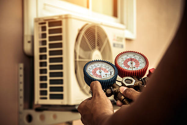 Professional Heat Pump Repair technician working in Taft, FL